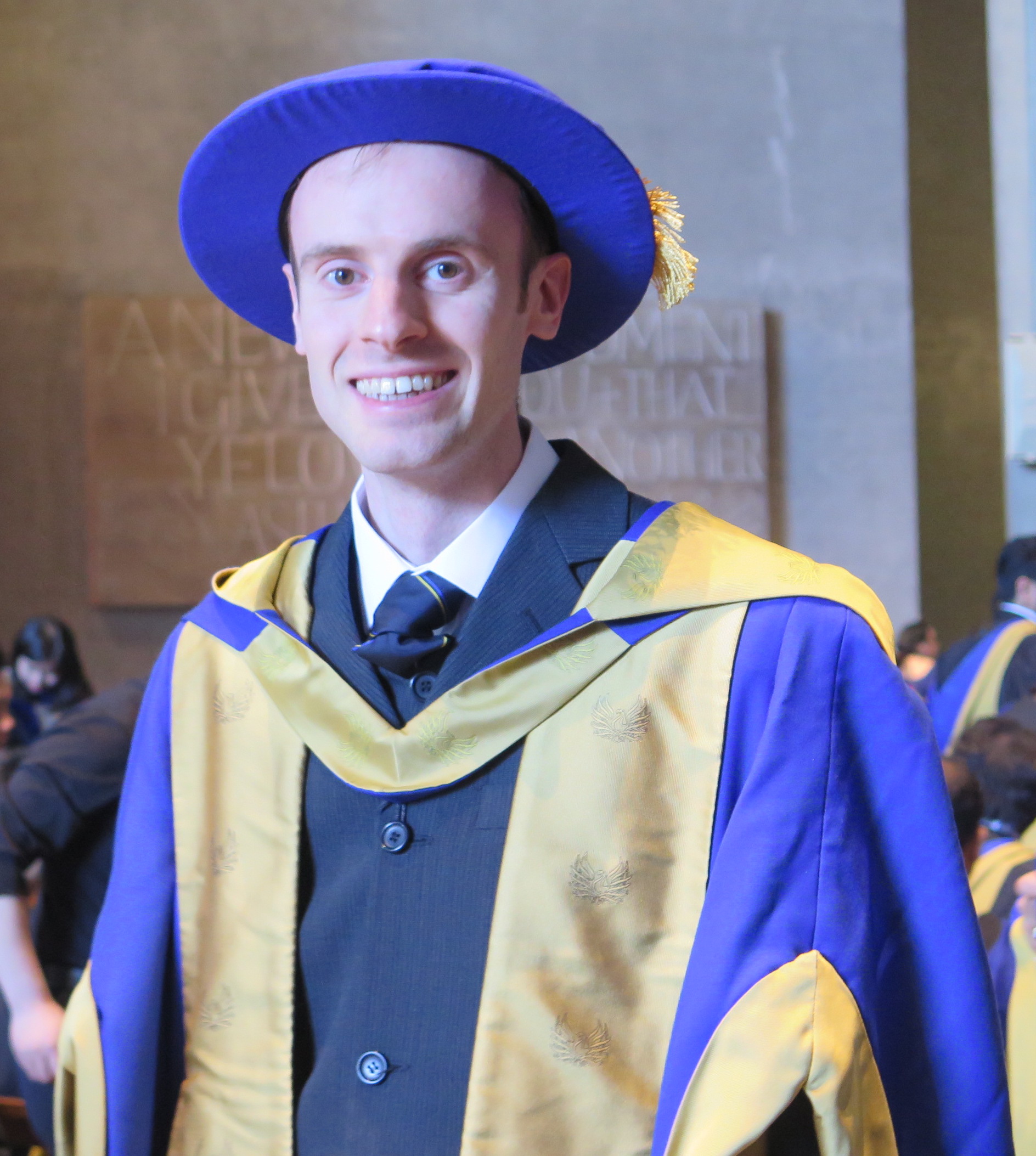 Dr Nicholas Peters in Coventry University PhD Academic dress at Coventry Cathedral