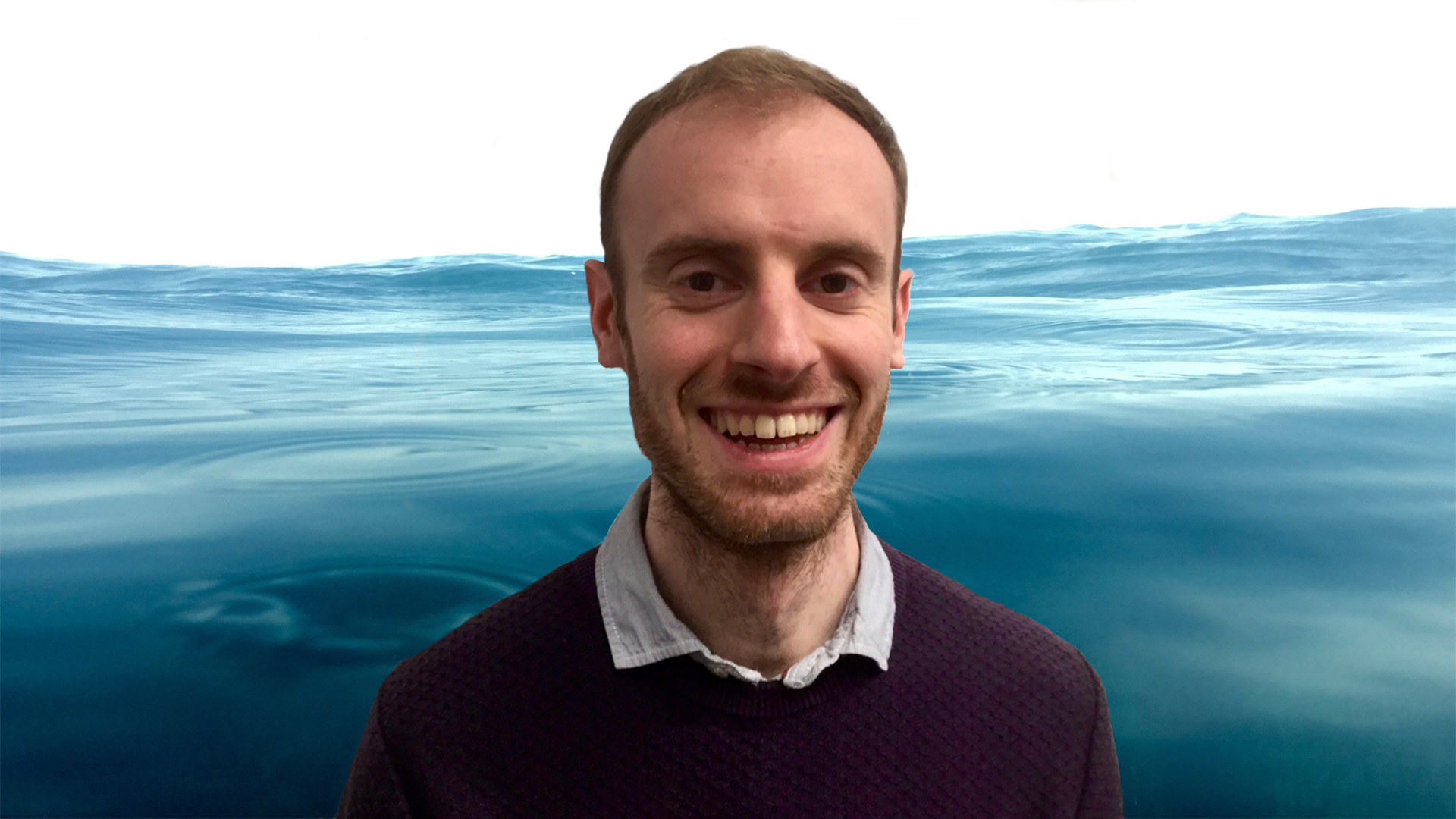 Nicholas Peters Profile Photo with sea in background, widescreen