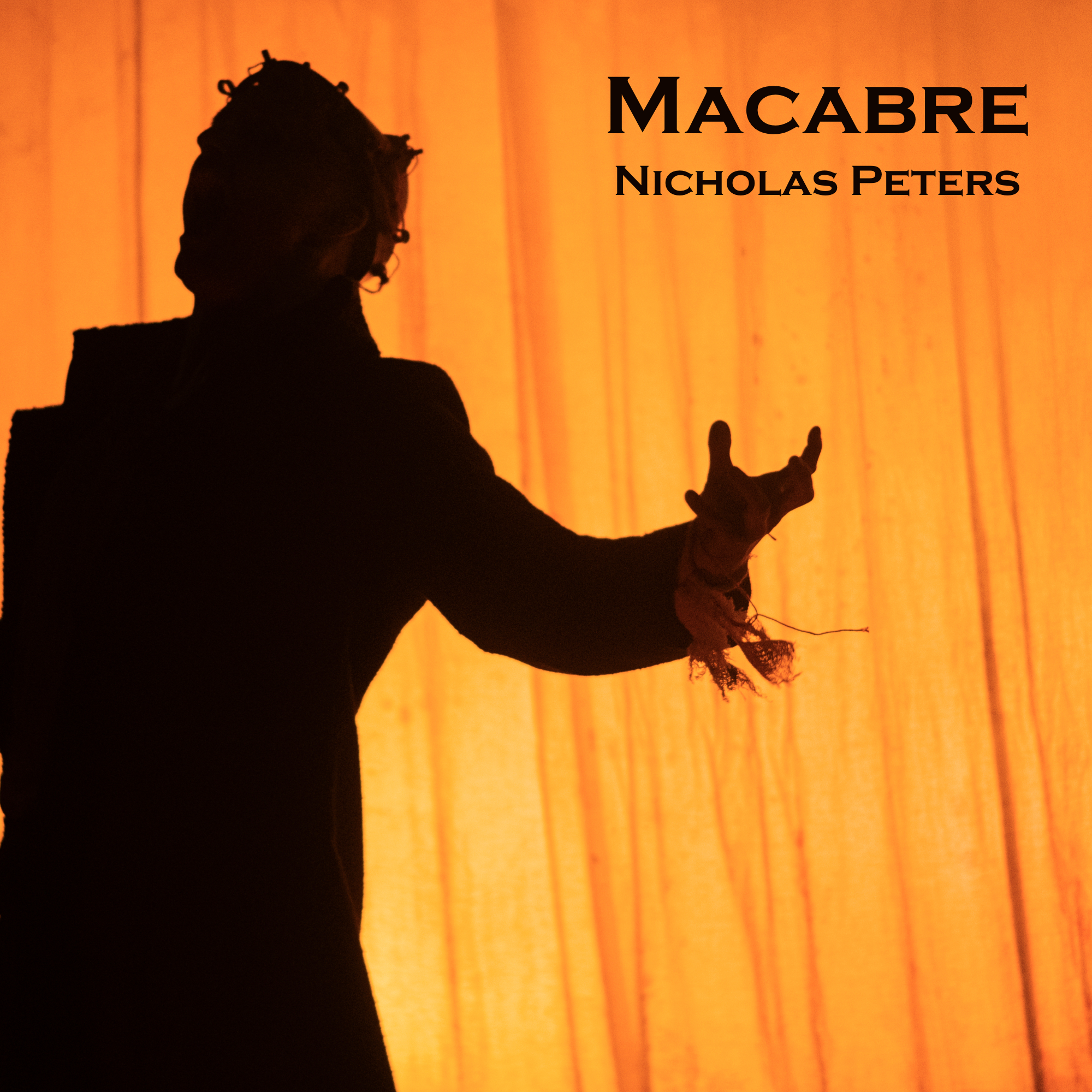 Text reads "Macabre Nicholas Peters".