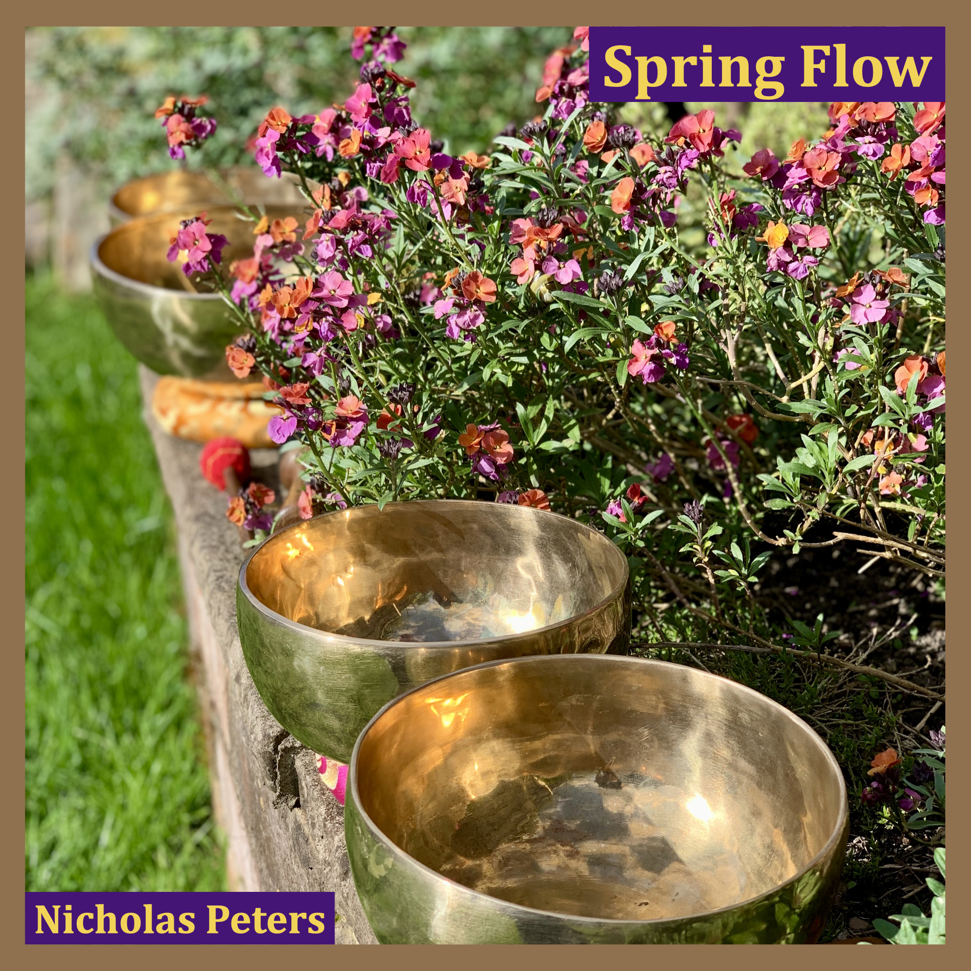 Single artwork with text that reads: “Spring Flow by Nicholas Peters". The photograph in the artwork shows four modern Himalayan singing bowls resting on brocade cushion rings on a small garden wall, surrounded by orange and pink flowers.
